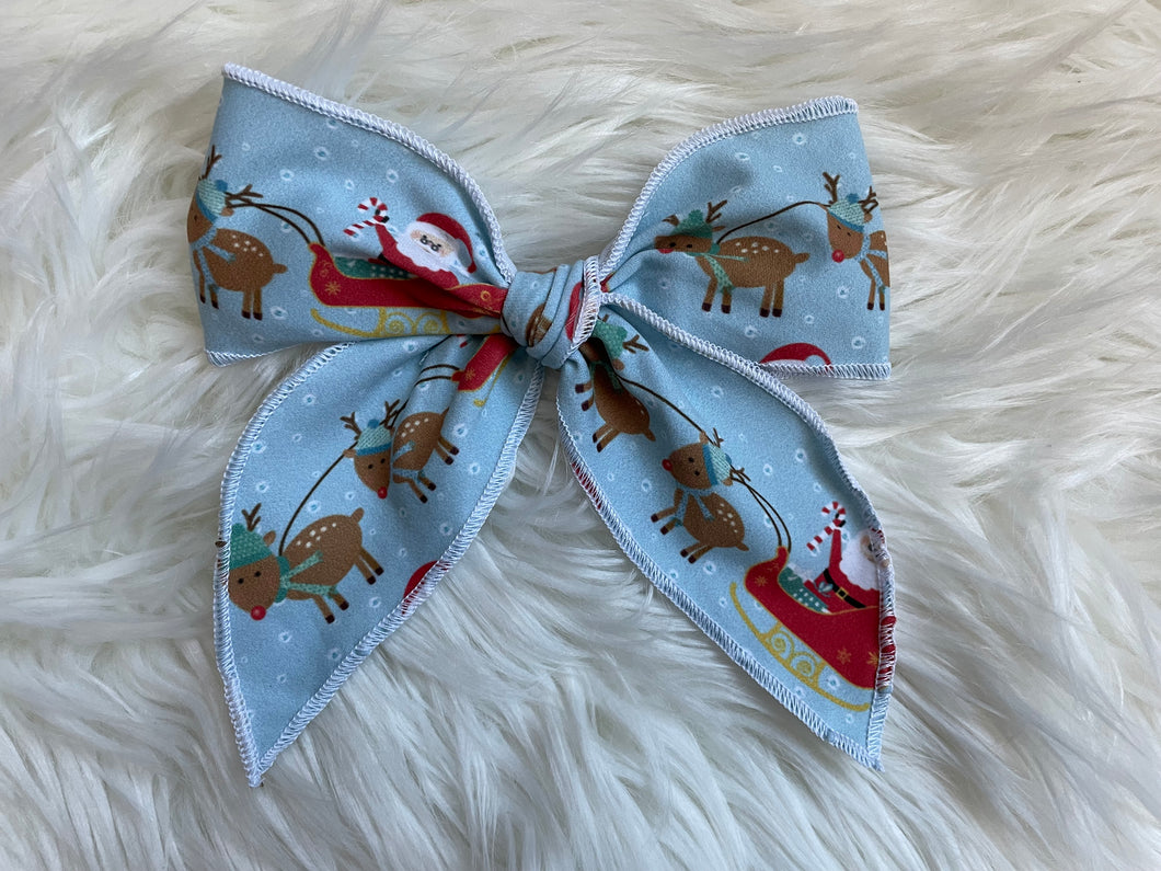 Blue Santa on a Sleigh Fable Hair Bow